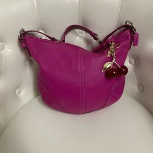Pink coach hobo